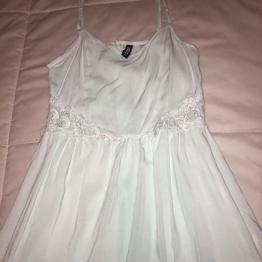 light teal dress with lace detail